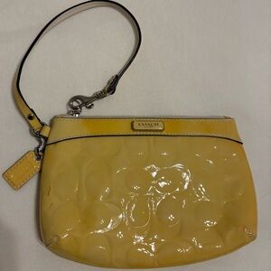 Coach Glossy Yellow Embossed Wristlet